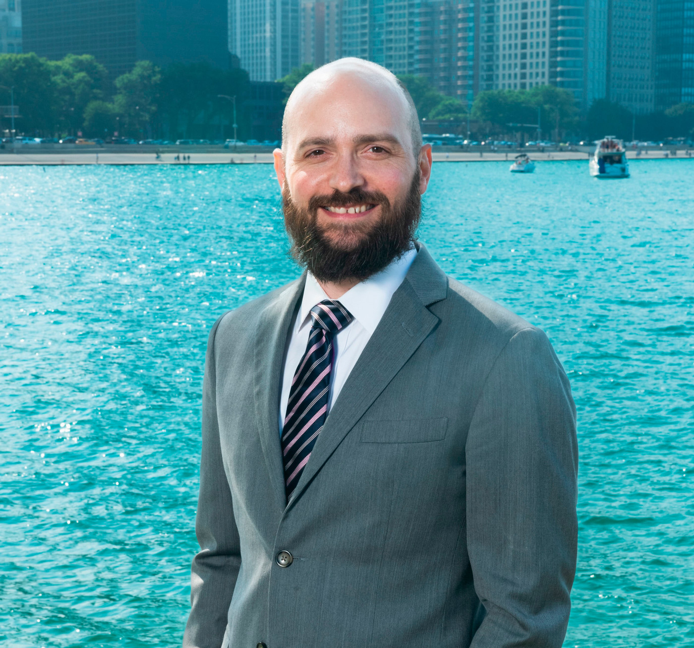 Andrew Berry the professor stands by the lake